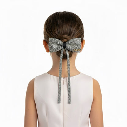 Barrette nœud argenté scintillant – Accessoire cheveux élégant et chic